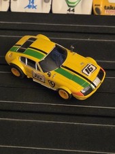 AURORA AFX SLOT CAR 16 FERRARI G-PLUS YELLOW BOTH MIRRORS INTACT