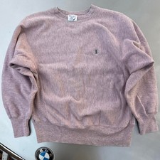 Vintage 1980s Champion reverse weave pink sweatshirt with a worn look streetwear