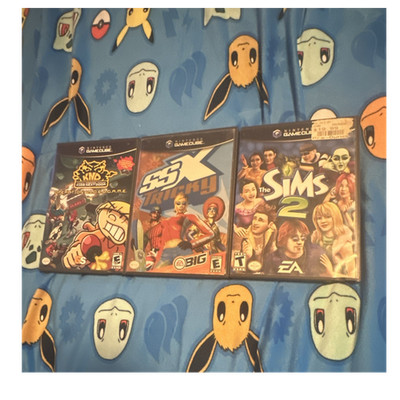 Nintendo GameCube Lot: Codename Kids Next Door, SSX Tricky, Sims 2 w/ Manuals