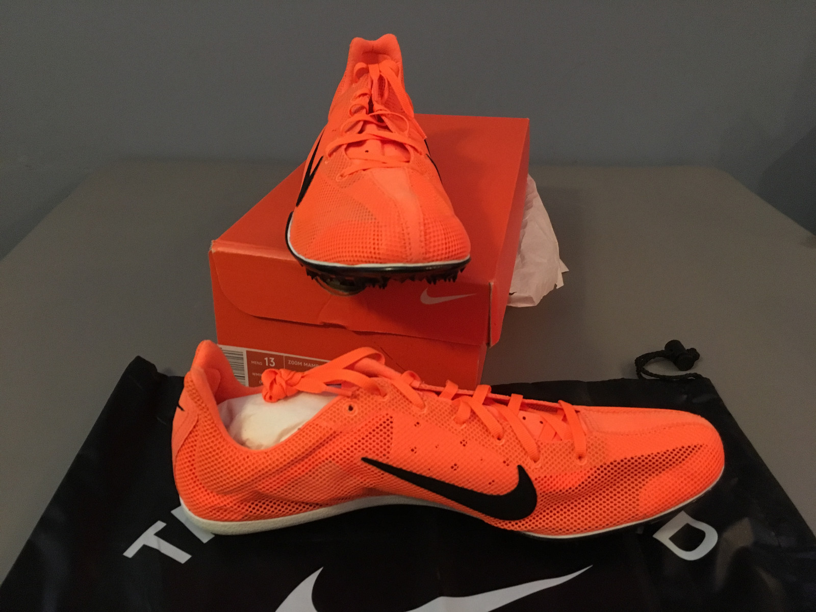 nike orange spikes