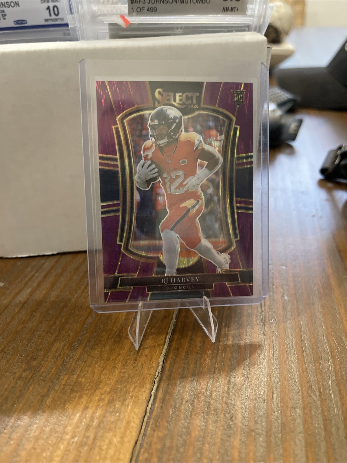 2025 Panini Select RJ Harvey #110 Premier Level Purple Shock /699 (RC)
