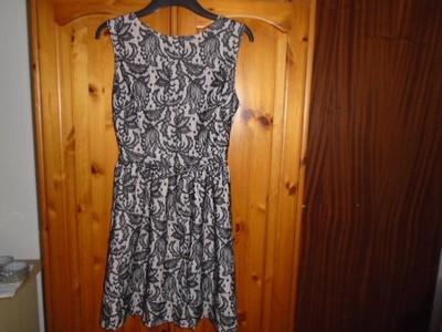 black lace dress with beige lining