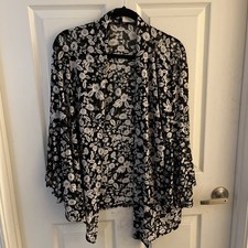 Kimono With Background That Is black With Tan Flowers