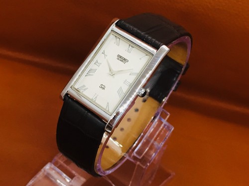 Vintage Seiko Quartz Slim Tank Roman White Dial Brown Leather Band Wrist Watch
