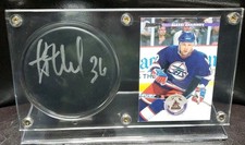 Alexei Zahmnov hockey card and autographed Puck
