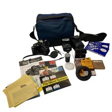 NIKON EM 35mm SLR Film Camera Bundle 50mm f/1.8 Lens, Case, Papers, Extras  