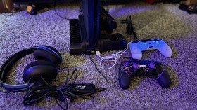 Play Station Slim 1- TB, 3 Controllers, 10 Games, 1 USB mic.  1 Fan/Charge Stand