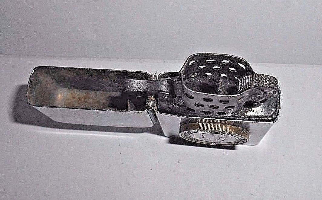 VINTAGE PENGUIN FLIP TOP CHROME CIGARETTE LIGHTER 2000 JAMAICA 20 DOLLAR COIN