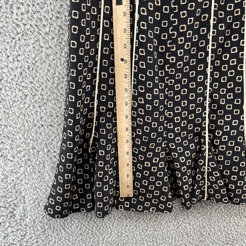 Vestido Scaasi Mujer Mediano Negro Seda Manga Corta Botón Frontal Ajuste y Acampanado Foto 4 de 4