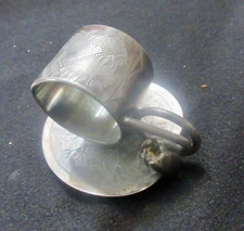 Antique 1900's etched silverplate napkin ring. Initials & tulip Hall& Miller Co?