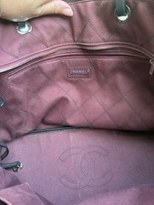 Chanel quilted black Caviar tote CC Charm