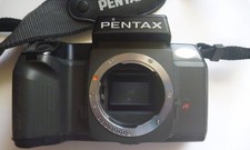 PENTAX SF10 35mm SLR black body. Comes with strap and used battery. WORKING