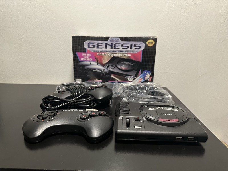 SEGA GENESIS MINI GAMING CONSOLE: 42 GAMES BUILT IN . 30TH ANNIVERSARY EDITION .