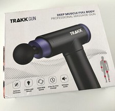 TRAKK Deep Tissue Handheld Massage Gun w/ 4 Speeds  Attachments New In Box