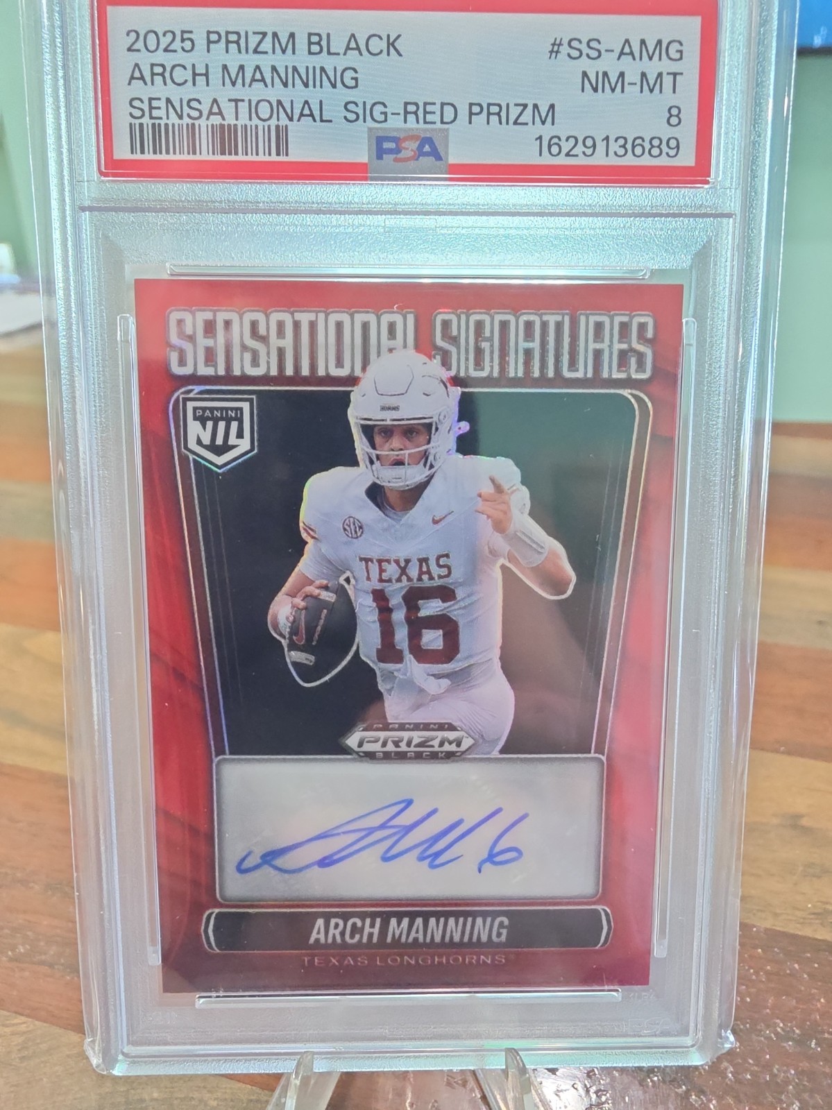 2025 Panini Prizm Black - Sensational Signatures Arch Manning #SS-AMG Red Prizm