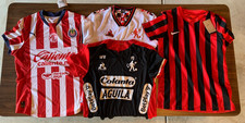 LOTE DE 4 CAMISETAS DE FÚTBOL. Le Coq Sportif, Nike, Puma. América de Cali. Talla mediana