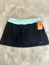 Champion women s athletic skort in black with a mint waistband. Size Small