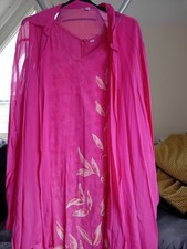 Long Pink Sleeveless  dress with A long Sleeved that gives great look