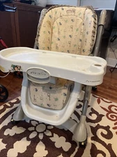 evenflo high chair with wheels