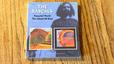 THE RASCALS     PEACEFUL WORLD/ THE ISLAND OF REAL    (2 TITLES ONE CD     MINT