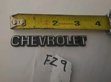 Nos 1977 78 79 80 Chevrolet Nova Malibu Plastic Trunk Lid Stick On Emblem Oem