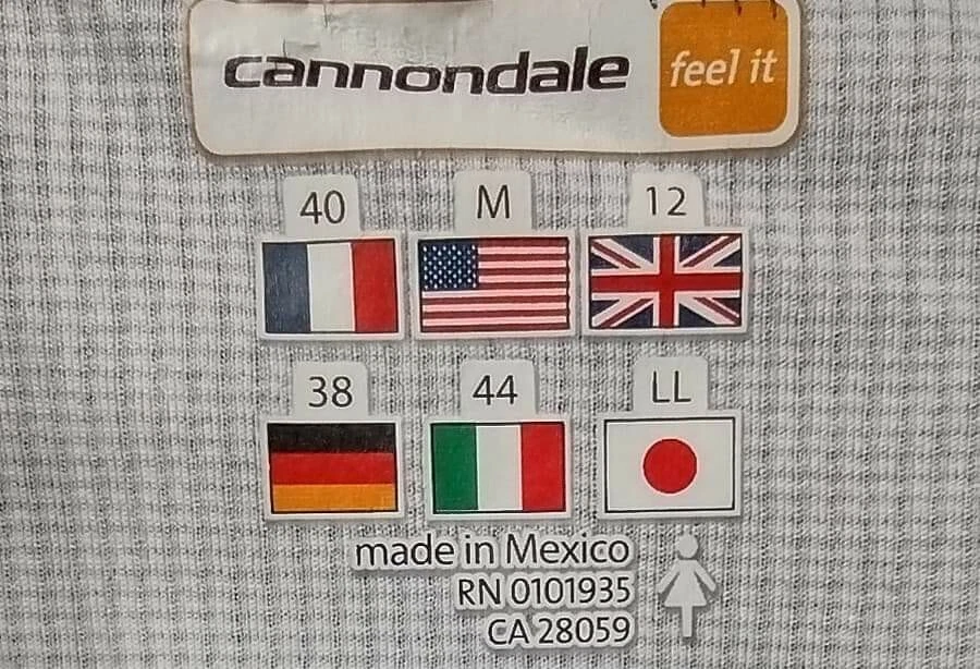 Camiseta deportiva de ciclismo Cannondale para mujer mediana manga corta 1/2 cremallera 3 bolsillos gráfica Foto 3 de 4