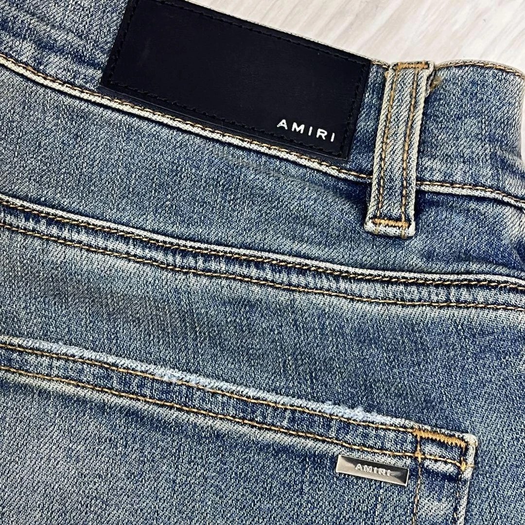 Jeans denim Amiri MX1 stampa animalier leopardato effetto invecchiato nuovo