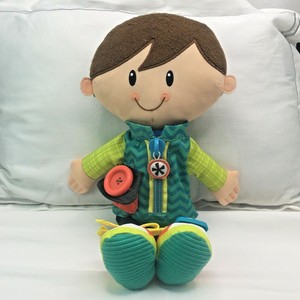 learning doll with zips and buttons