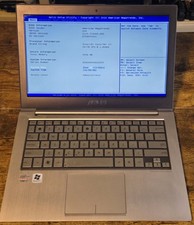 Asus UX31E Notebook PC I7-2677M 4GB-RAM *No SSD* Charger, Boots Into BIOS