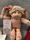 cabbage patch vintage doll. Blonde with green eyes and red jumper BCert included