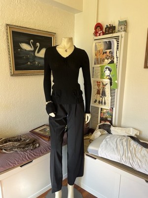 Black high-waisted trousers with button detail