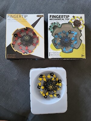 3 Fingertip Mechanical Top  rot blau gelb