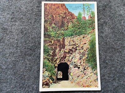 Looking thru a 500 foot tunnel on the Phantom Canyon Highway, Colorado Postcard