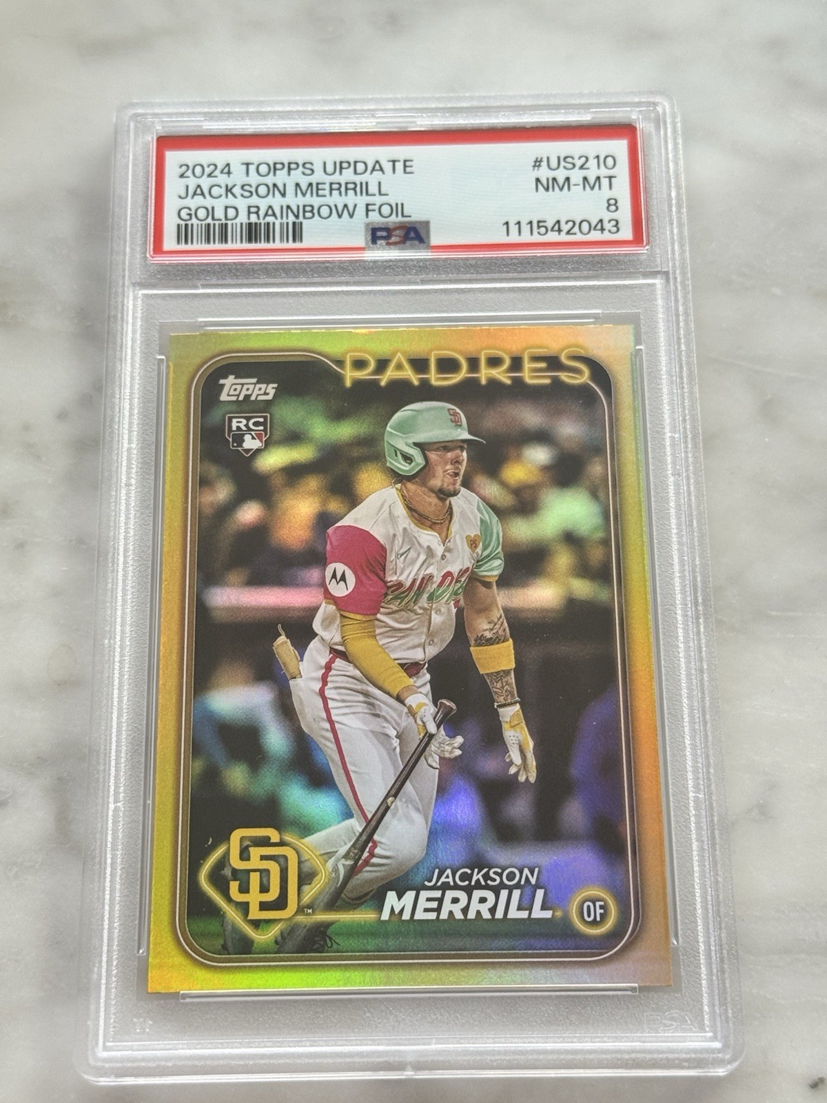 2024 Topps Update Series - Jackson Merrill #US210 Gold Rainbow Foil (RC)