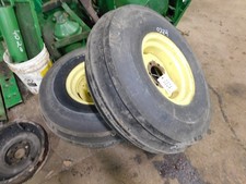 John Deere 4020 Tractor, 2 Front Tires And Rims 10.00-16sc 75% Tread, Tag #0324