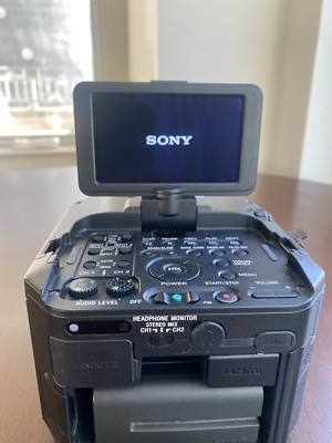 Sony NEX-FS100U Camcorder   Super 35mm   Working   Batteries + Charger   No Lens
