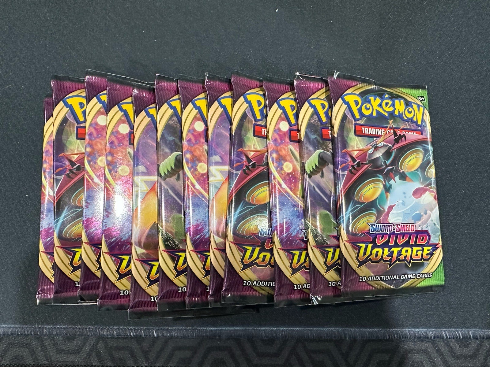 POKEMON TCG!  12x SWSH Vivid Voltage BOOSTER PACK SEALED BRAND NEW