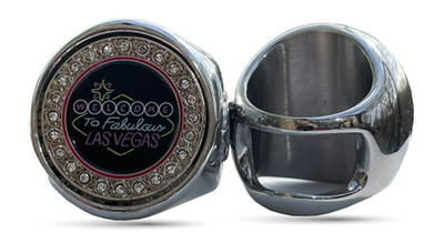 The Welcome to Las Vegas deCAPitator ring bottle cap and can tab opener!