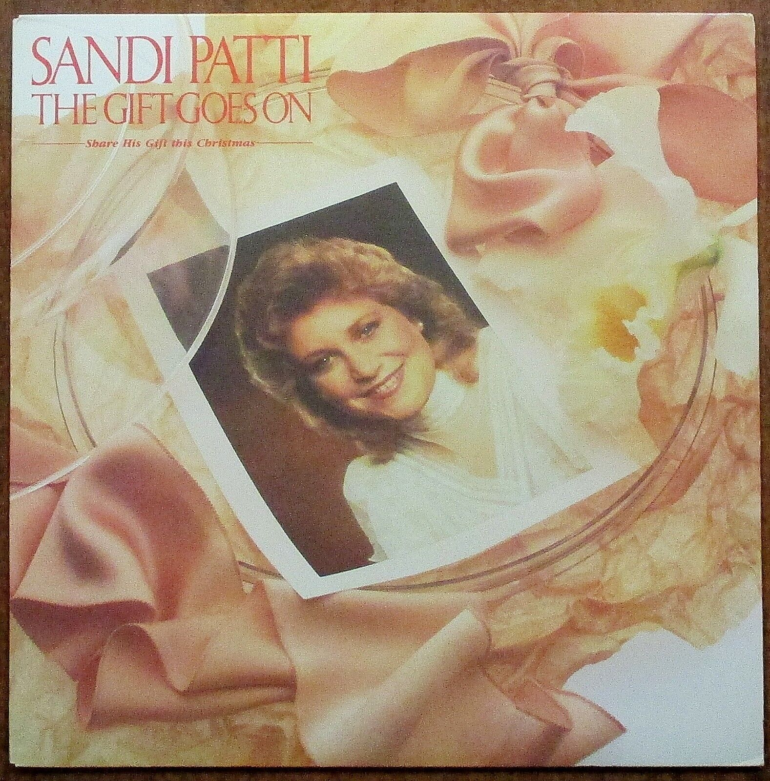 Sandi Patti "The Gift Goes On" Share His Gift This Christmas LP (1983)