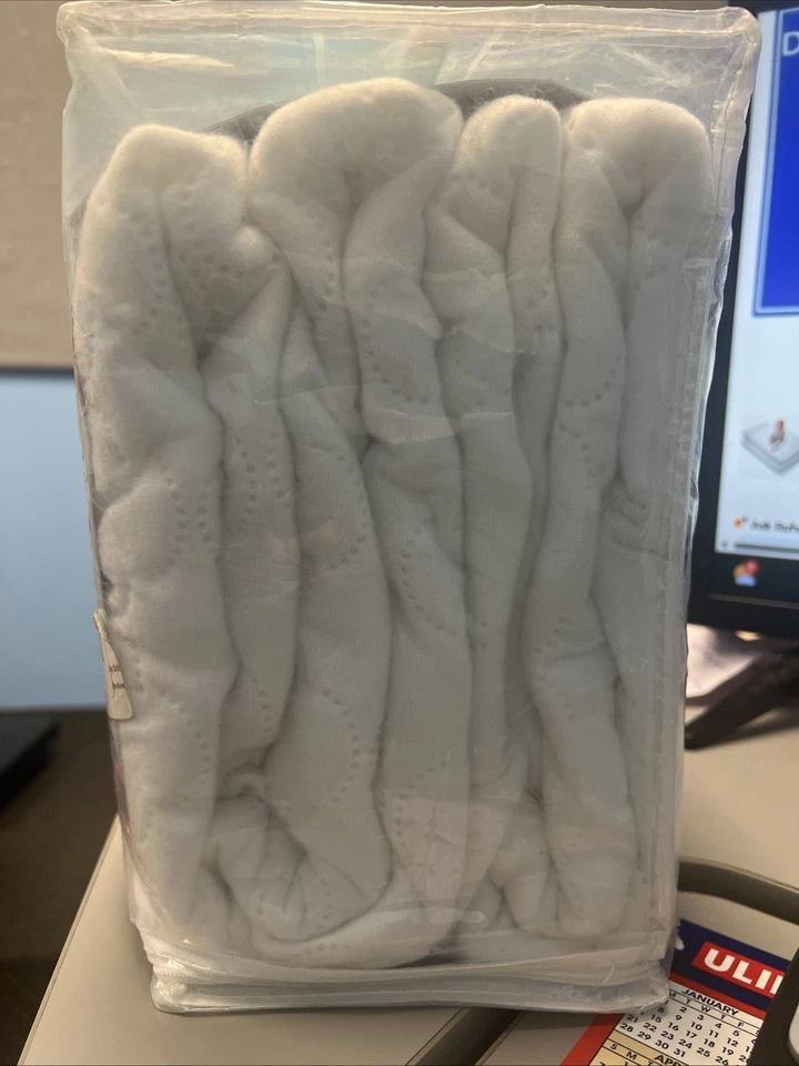 Paquete de 2 almohadillas impermeables para colchón para cuna Sealy ED008-QWX3 52x28 Foto 3 de 4