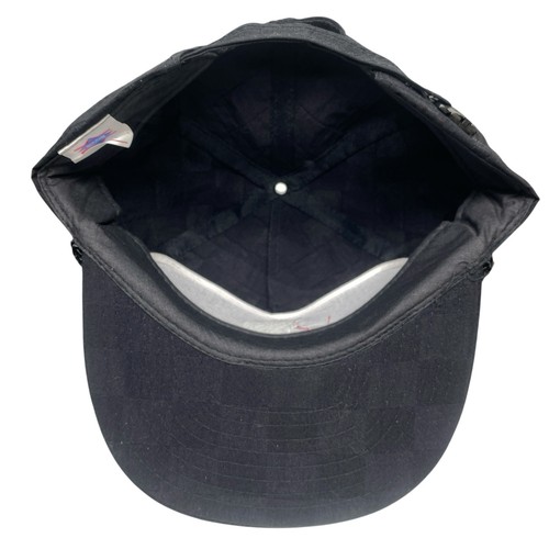 Black snapback patch hat with soft black fabric interior, front button closure, and small white label reading “Citgo.”