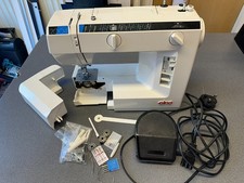 ELNA 2004 Sewing Machine With Foot Pedal, Accessories and Dust Cover.