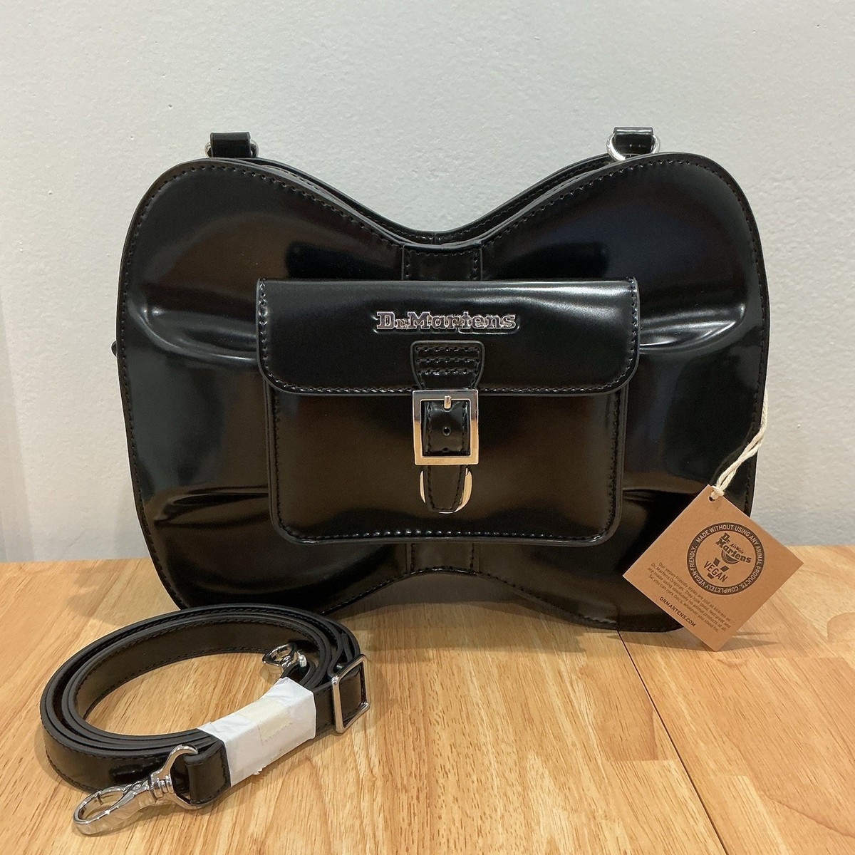 ??Dr Martens Black Vegan Leather Large Backpack Shoulder Bag Love Bow Crossbody Dr. Martens Vegan Leather Bow Shaped Bag, Black Oxford Rub  main image 2
