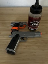 Airsoft Gun Two Pictured Air Soft Plastic BB No C02 Just Pump Action Pistol