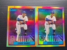 2025 Topps Update Ernie Banks 35th Anniversary Pink Foil SP And Base Version.