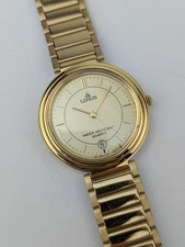 Vtg NEW OLD STOCK Lorus Gold Tone Quartz Analog Date Watch 34mm Men's V537-6A30