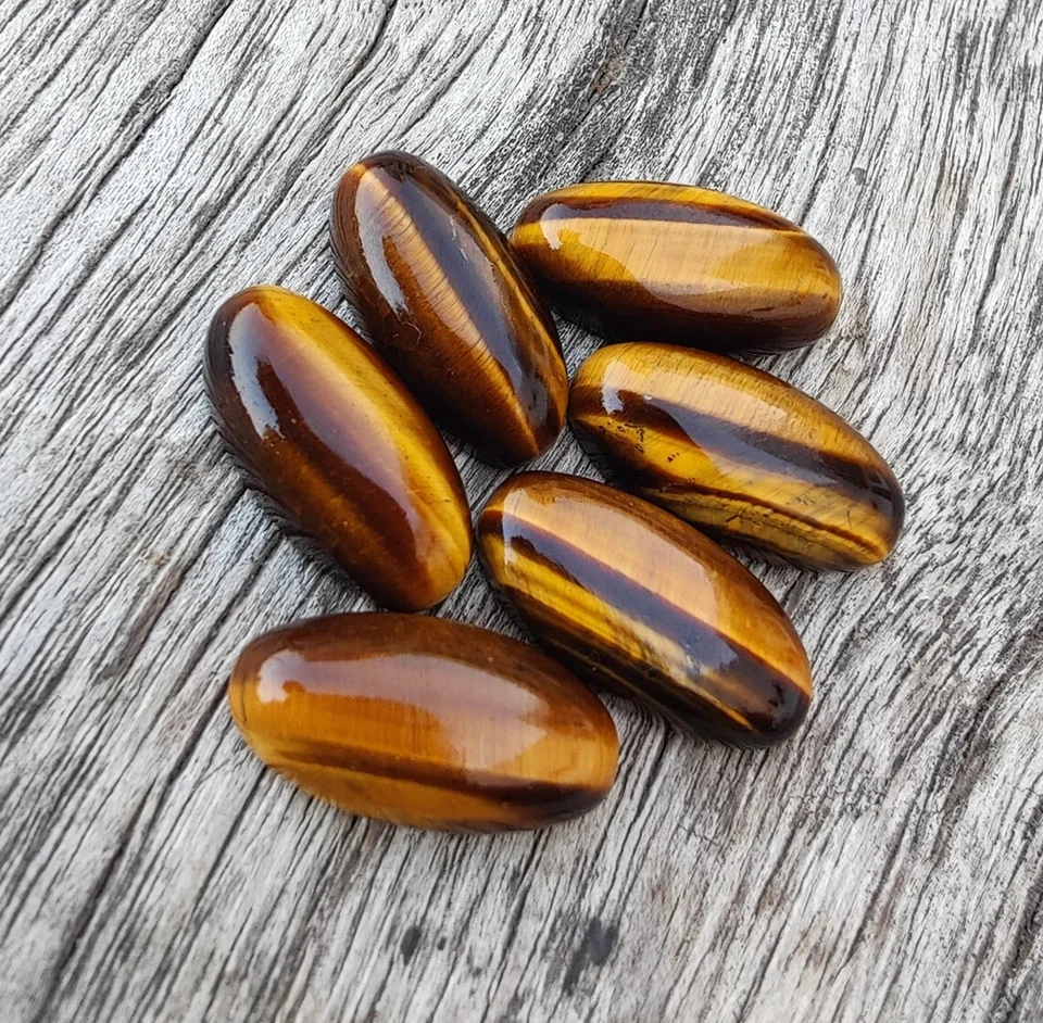 Lote al por mayor de piedras preciosas 3x6mm-10x20mm cabujón forma ovalada larga ojo de tigre natural Foto 3 de 4