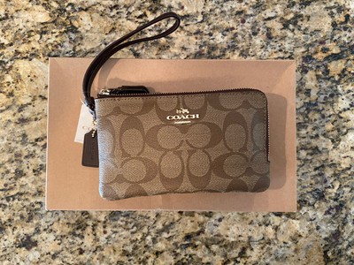 coach corner zip wristlet in signature canvas