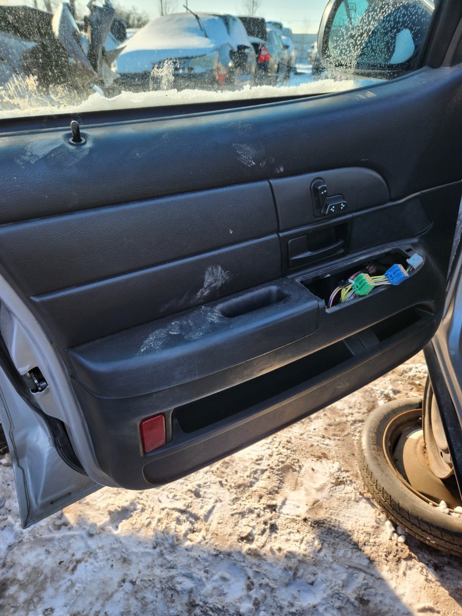 09-11 FORD CROWN VICTORIA DRIVER SIDE FRONT DOOR PANEL BLACK COLOR