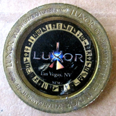 LUXOR LAS VEGAS $1 GAMING TOKEN, METAL, 1 1/2'', USED